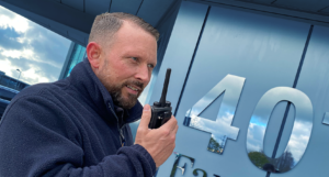 A Westgrove security colleague at Birchwood Park on his walkie talkie